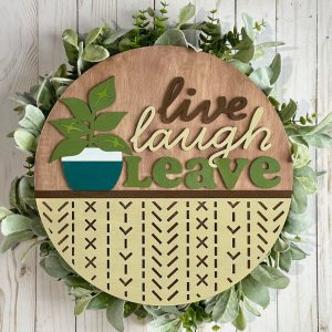 Painted version of wooden sign kit saying Live Laugh Leave.