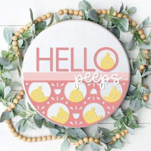 Painted version of wooden sign kit saying Hello Peeps.