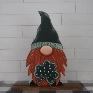 Painted version of a wooden cutout gnome that we call Belvin