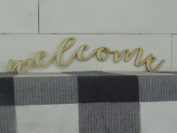 Lower case arched welcome