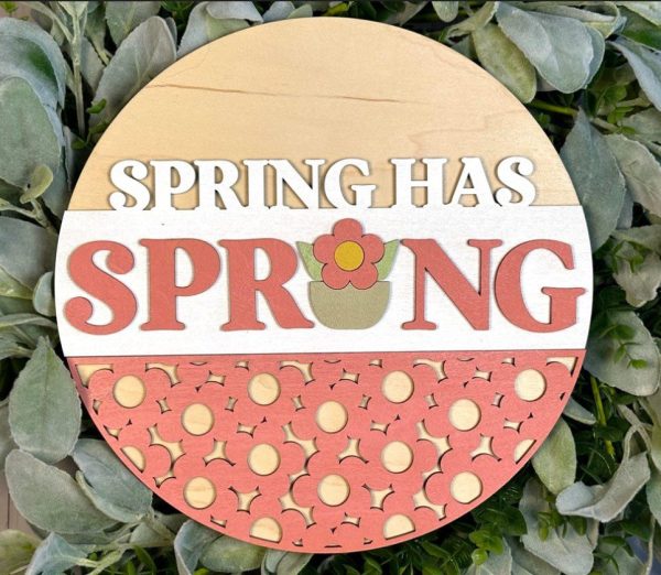 Unfinished version of wooden sign kit saying Spring has Sprung.